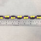 Bracelet with Yellow Skulls and Purple Beads