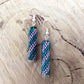 Beaded dangle earrings - diagonal stripes in green, brown, purple, black